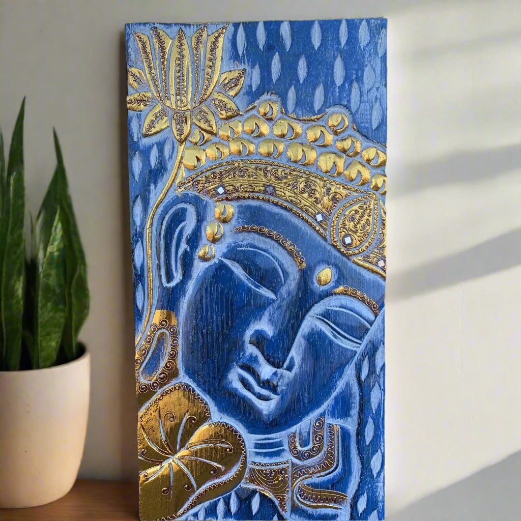 Blue Buddha head with gold ornate crown and lotus motif