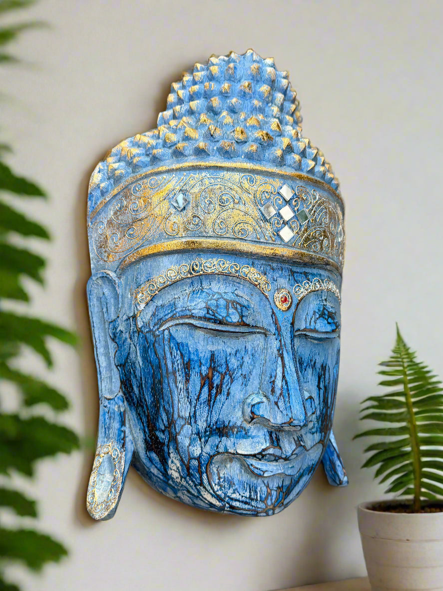 Blue Buddha head wall sculpture with gold ornate crown