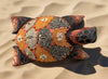 decorative mosaic turtle figurine with pebble shell on sand