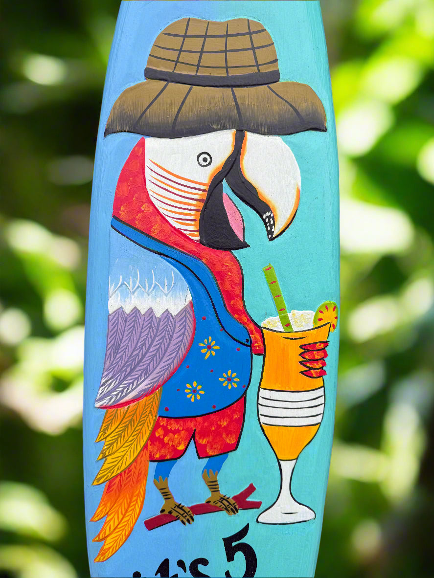 Colorful parrot painting with a hat and a cocktail on a turquoise background