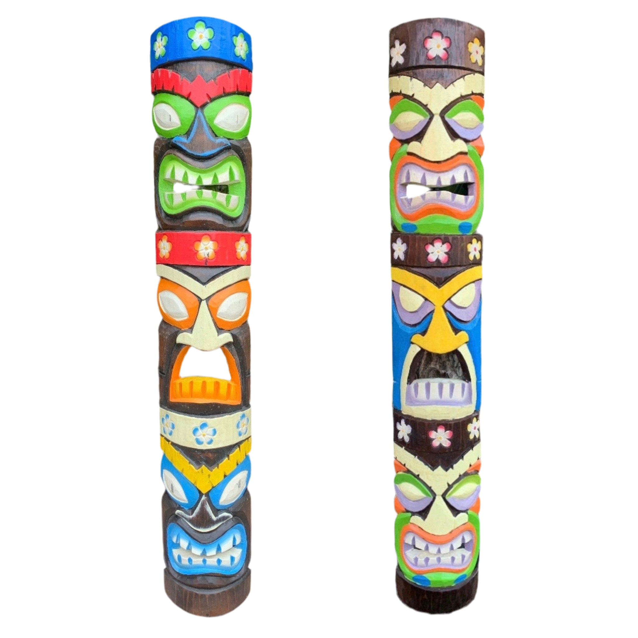 Two colorful tiki totem poles with carved faces and floral decorations.