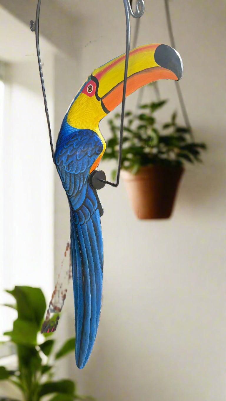 Colorful toucan-shaped hanging sculpture indoors