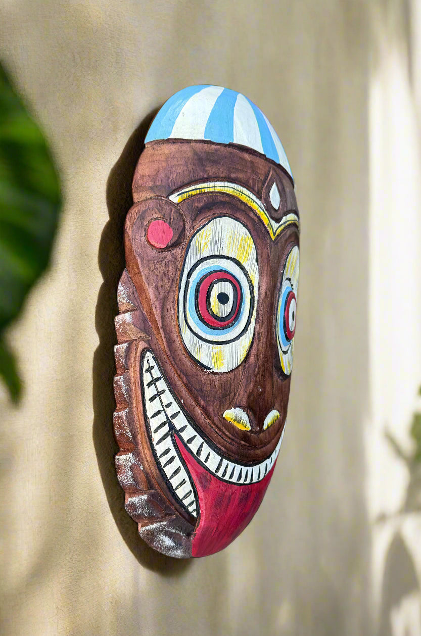 Colorful hand-painted wooden tiki mask wall hanging