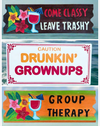 Three colorful wooden signs with drinking humor: Come classy, leave trashy; Caution: Drunkin' grownups; Group therapy.