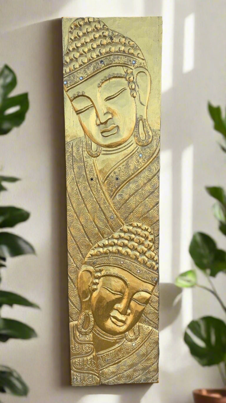Vertical gold Buddha relief panel with ornate swirling patterns and blue gemstone accents.