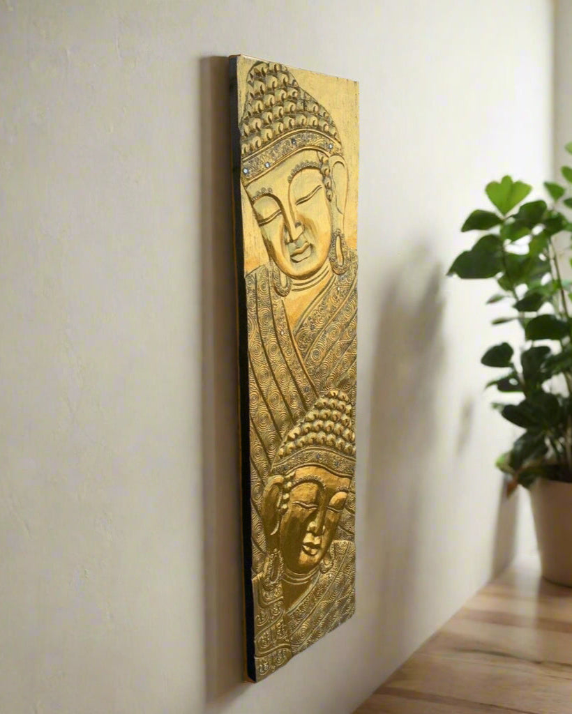 Vertical golden Buddha relief wall panel featuring two figures and ornate patterns