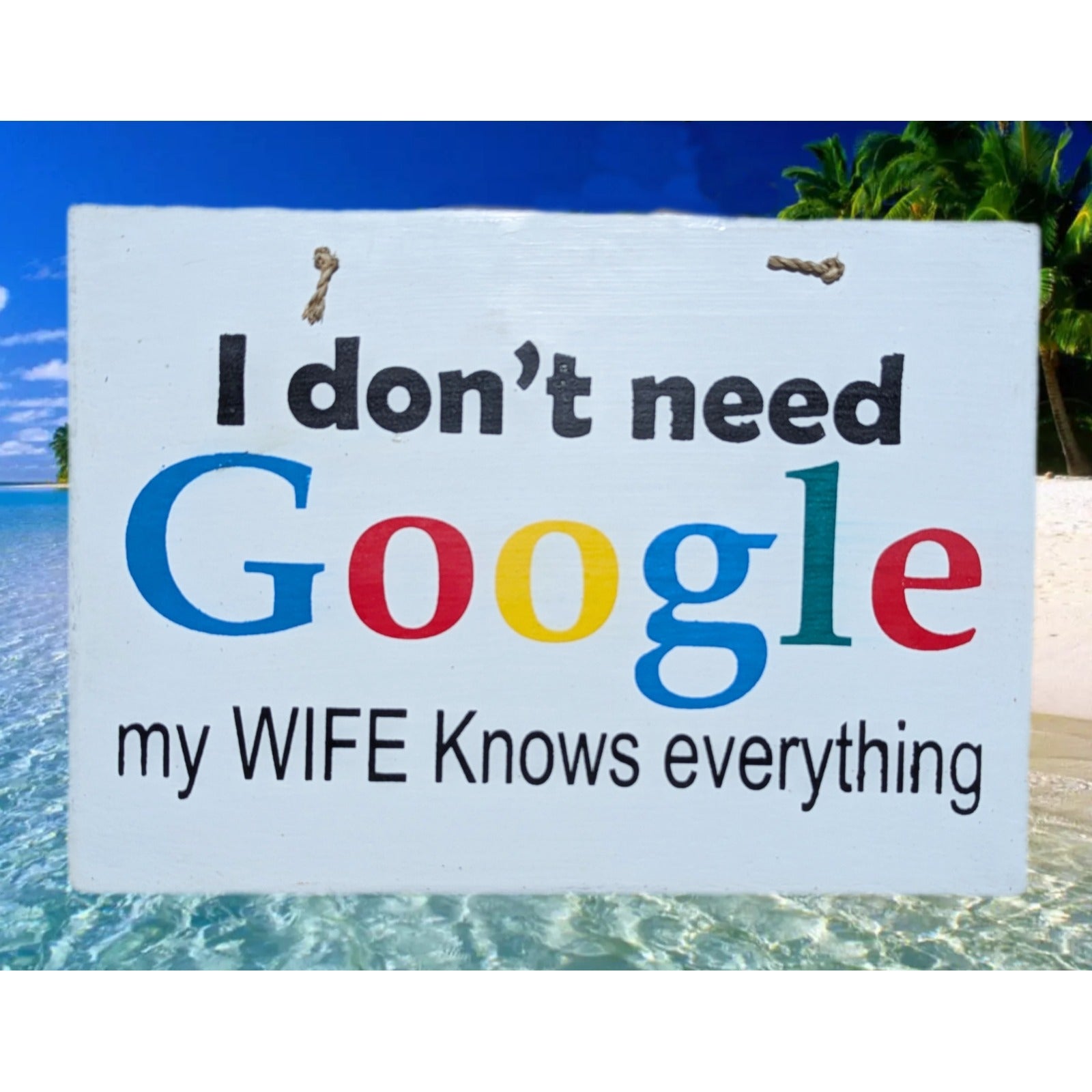 Sign on a beach reading: I don't need Google, my wife knows everything.