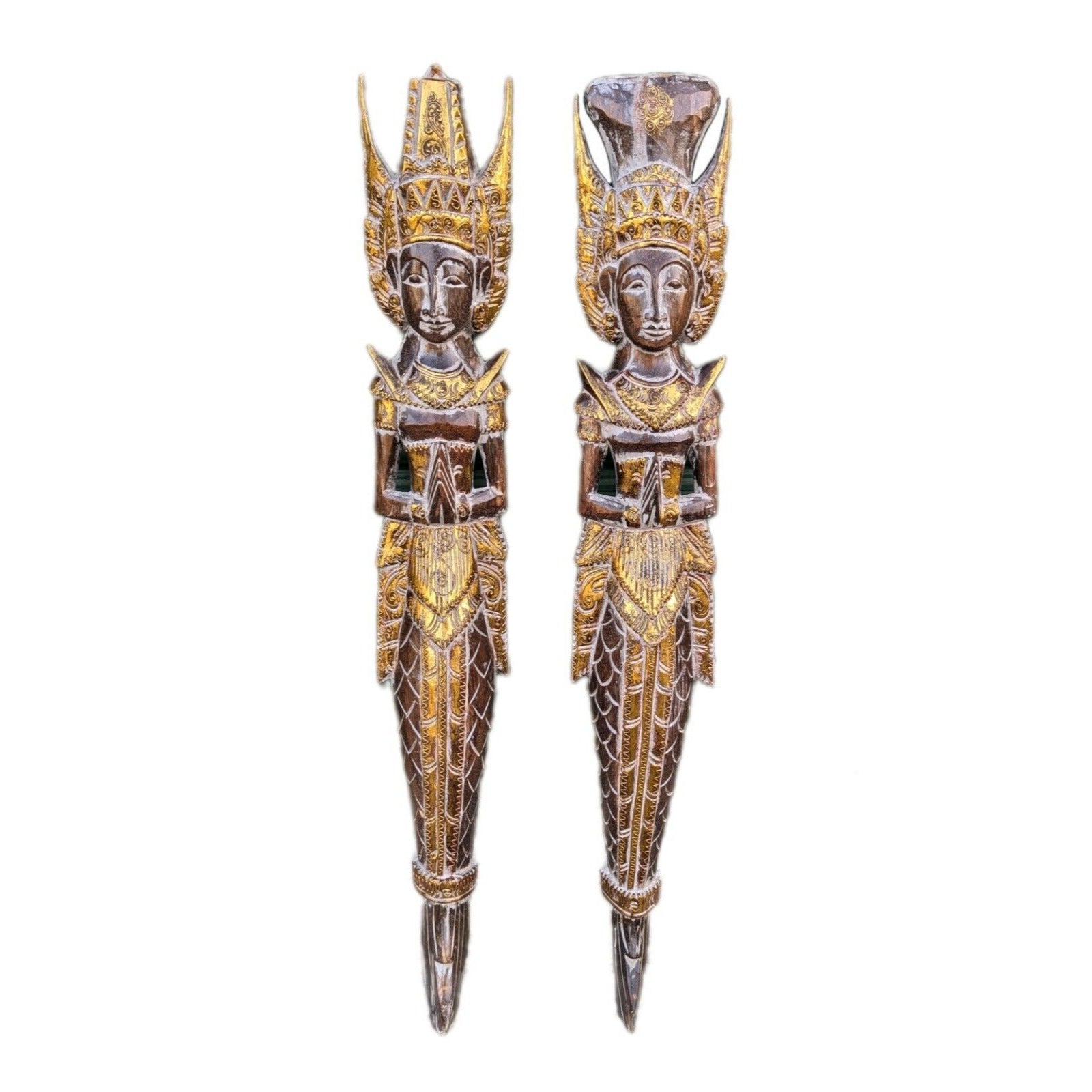 Pair of ornate golden Thai guardian statues with tall crowns and green inlays