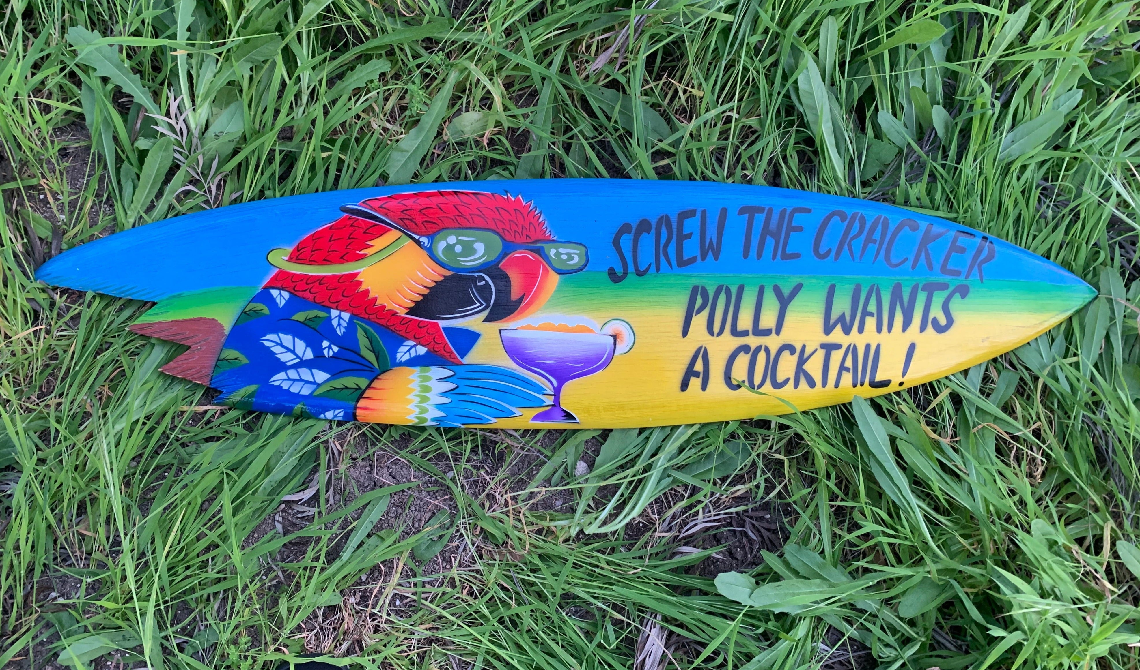 Colorful parrot on a gradient surfboard wearing sunglasses, with a cocktail glass and bold text
