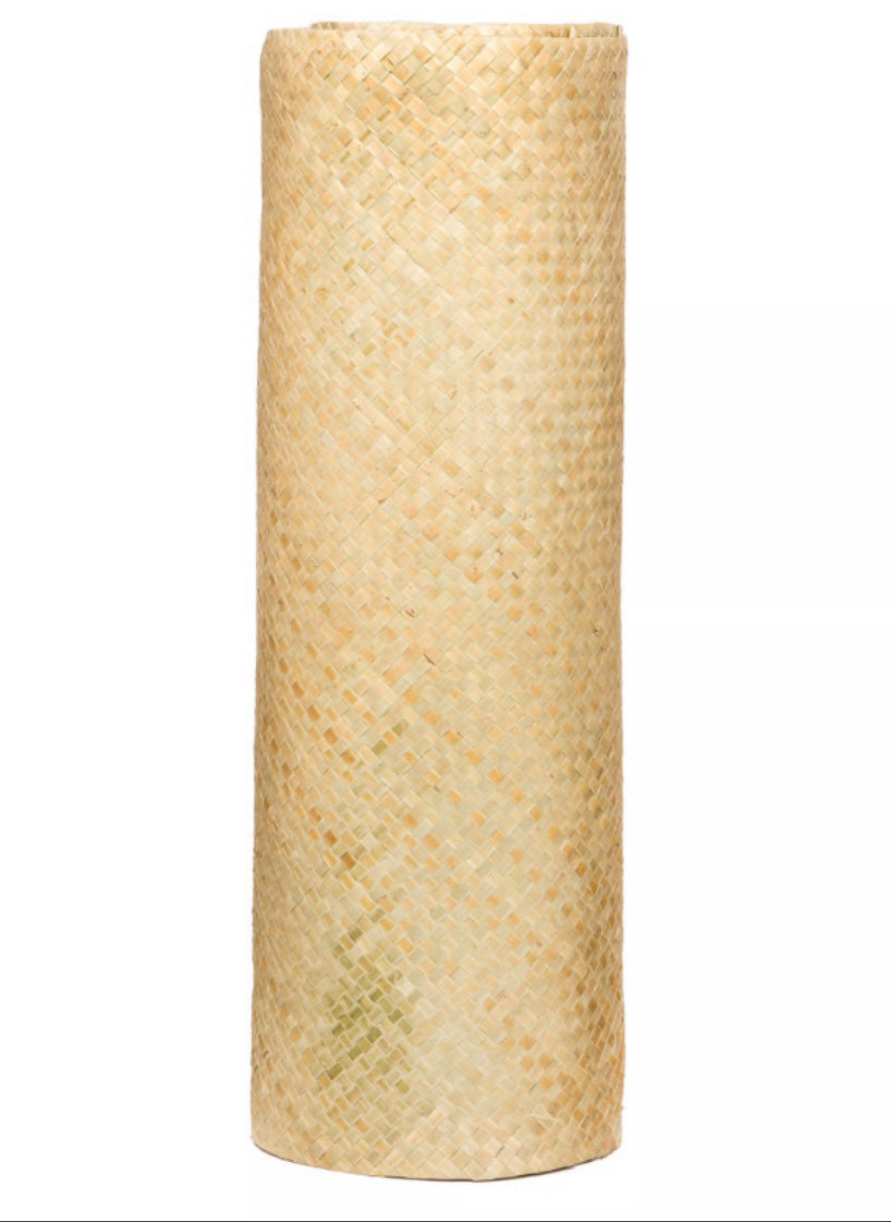 Rolled bamboo woven mat in natural beige color