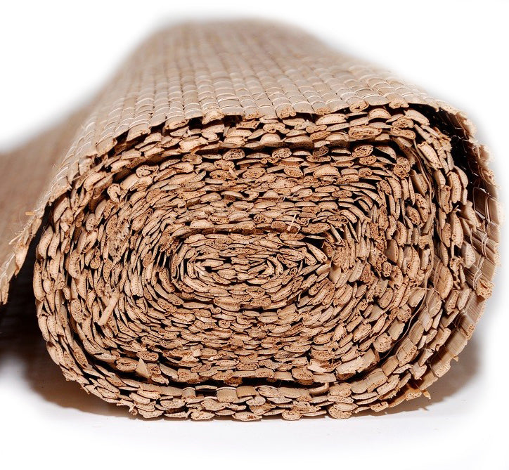 Close-up of a rolled natural cork mat showing layered cork pieces