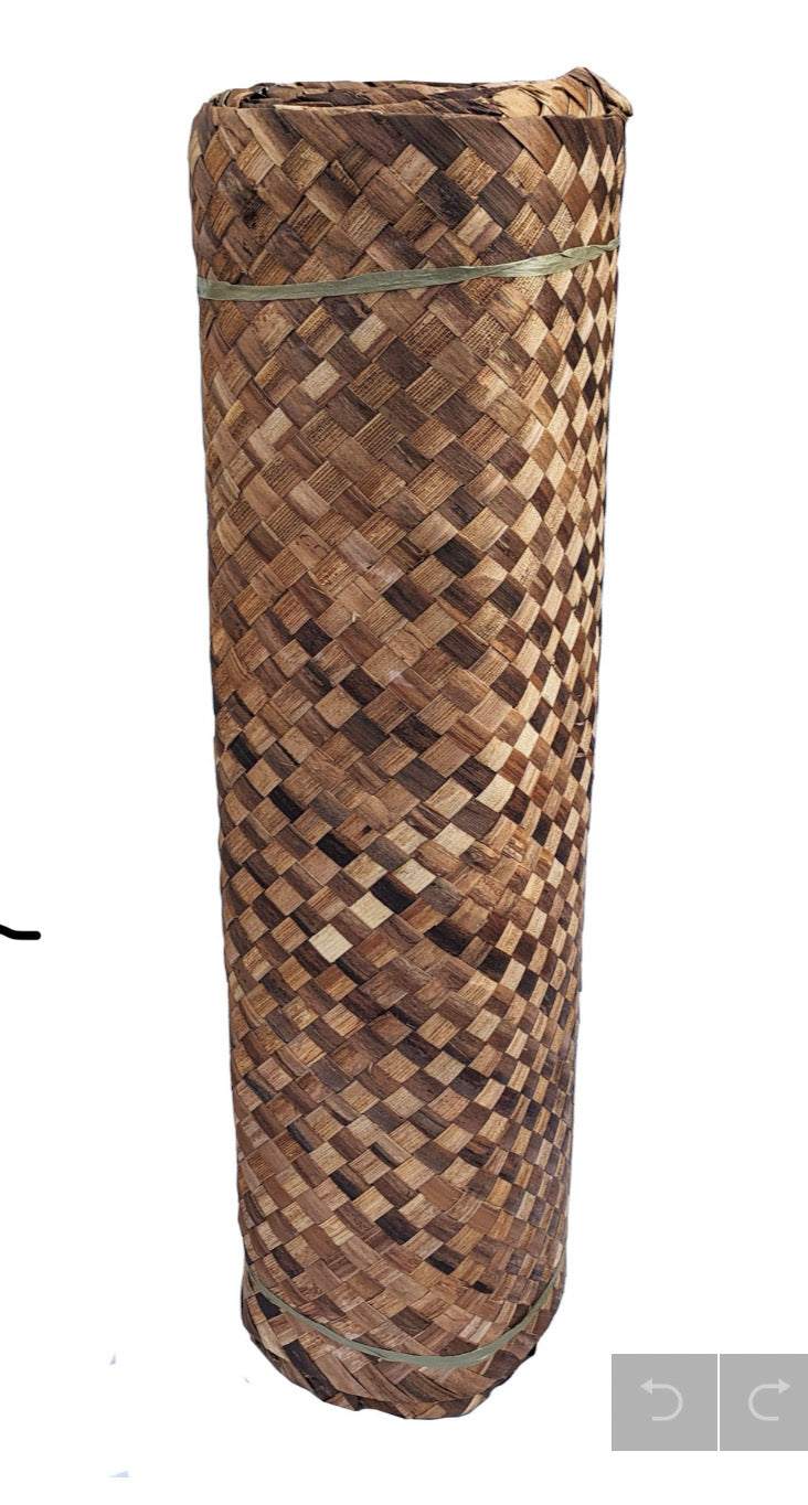 Rolled-woven palm-leaf basket mat with brown and tan checker pattern