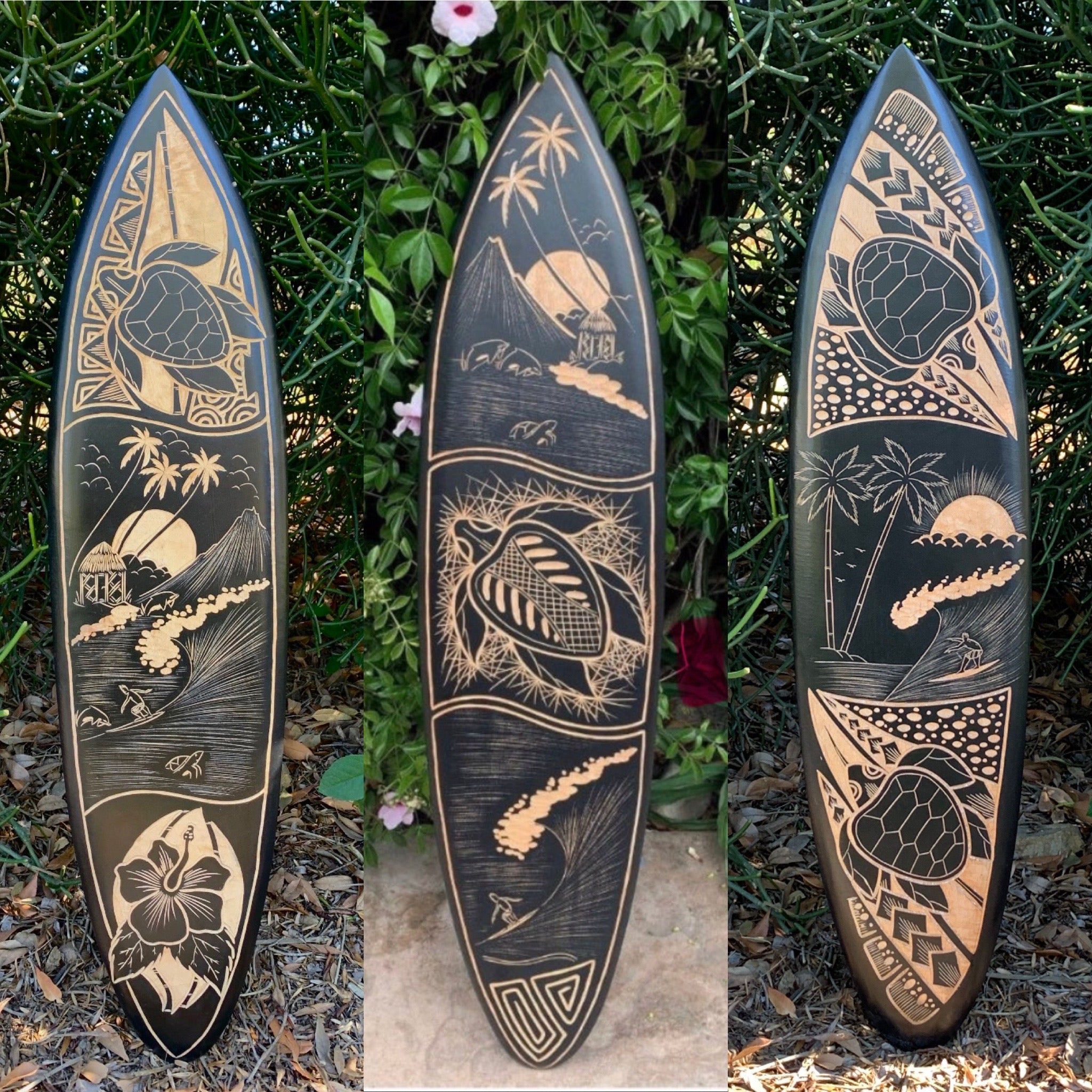 Set of three hand-carved Polynesian surfboards featuring tropical scenes with palm trees, waves, and sunsets.