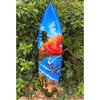Colorful surfboard with tropical beach scene and palm trees