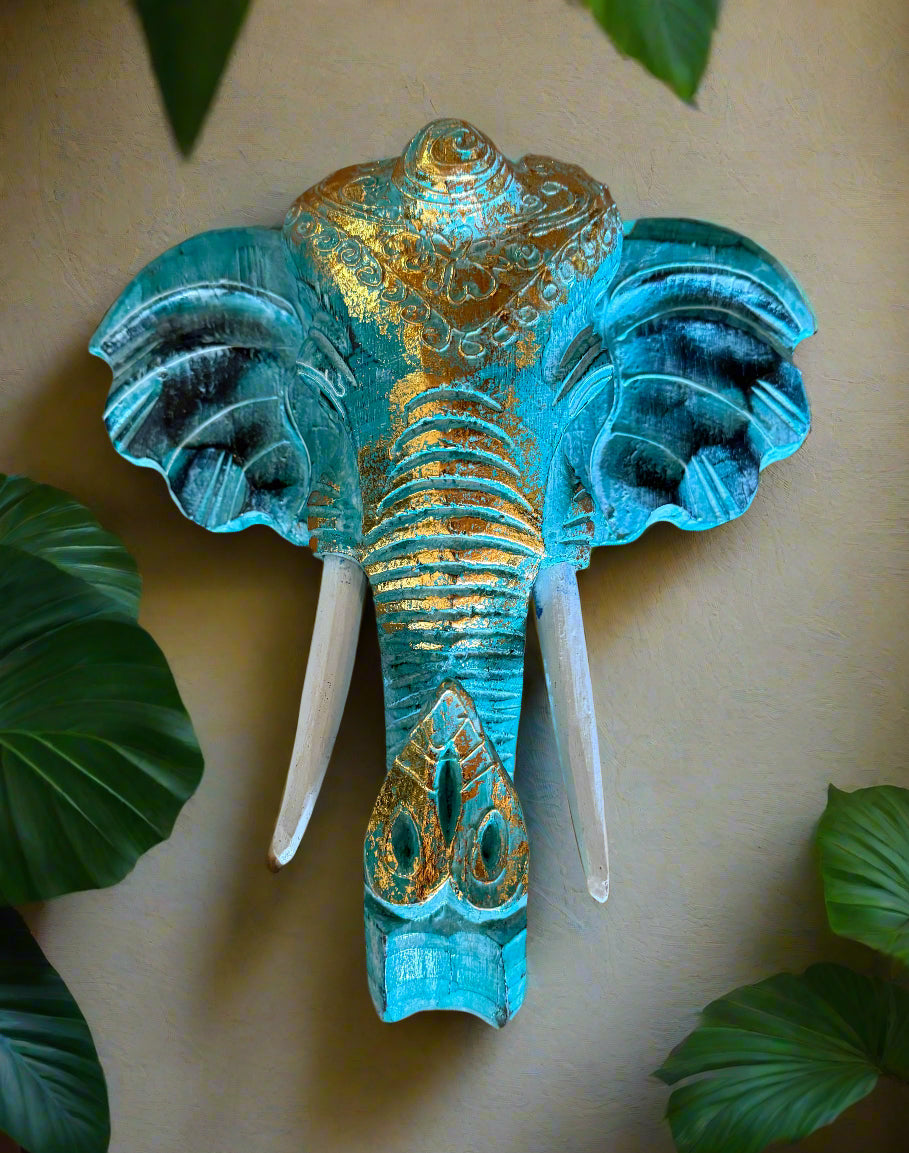turquoise elephant wall sculpture with gold detailing