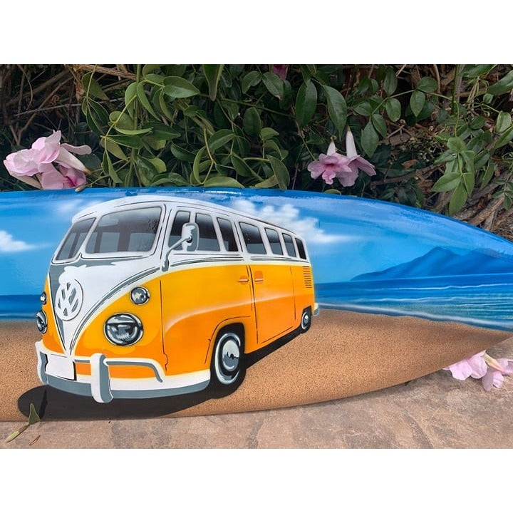 vintage orange VW bus painting on a surfboard with a beach scene