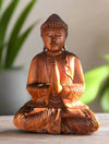 Wooden Buddha statue meditating with hands in prayer