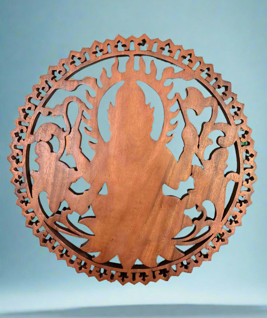 Wooden circular mandala featuring a meditative silhouette and intricate border.