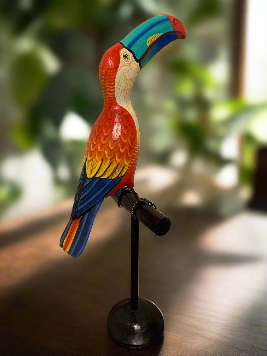 colorful parrot sculpture on stand