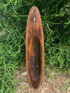 Hand-carved wooden scoop with braided rope border