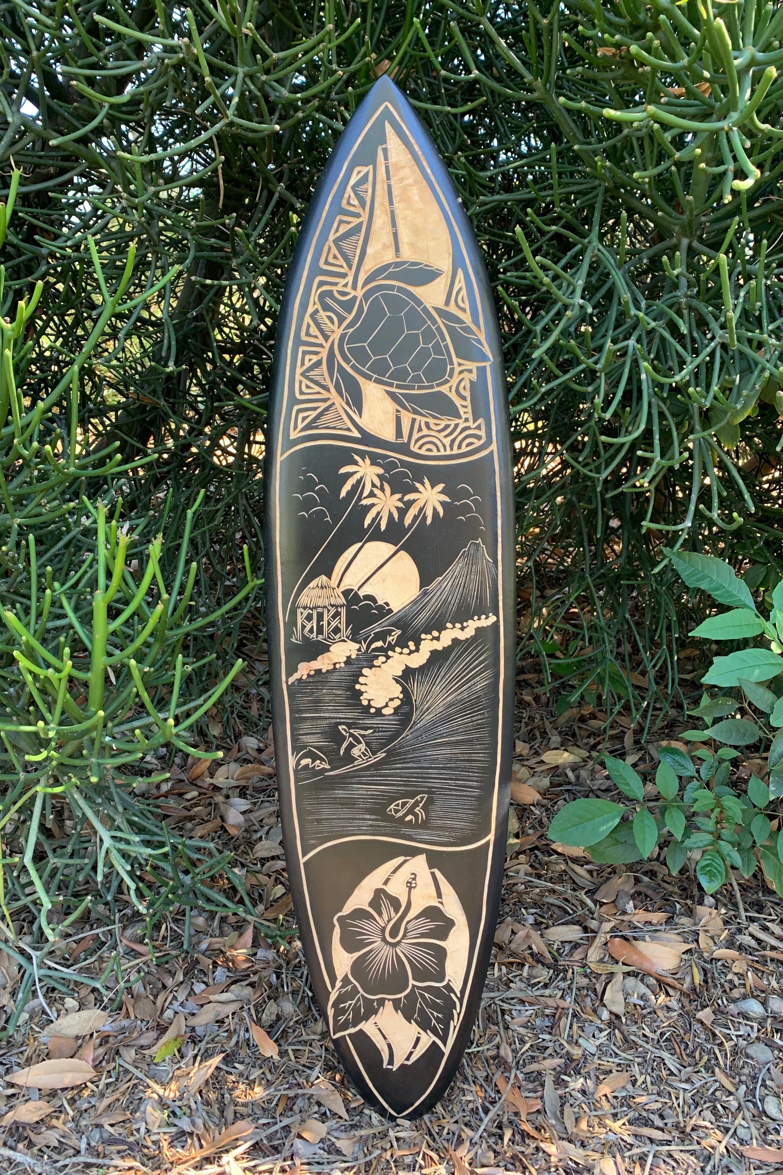 Hand-etched hawaiian surfboard with turtle, palm trees, volcano, and hibiscus design
