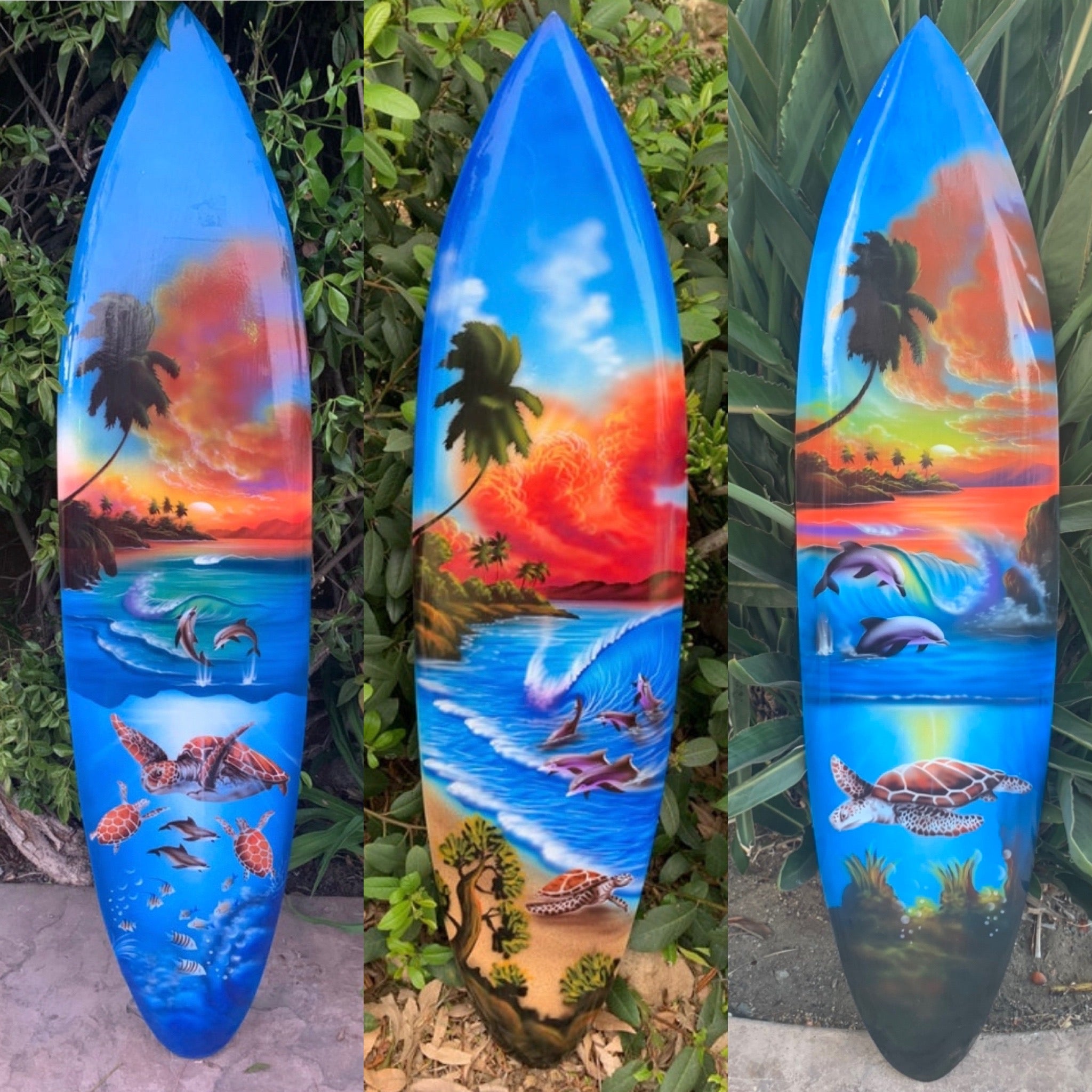 tropical-sunset surfboard art with dolphins, turtles and palm trees